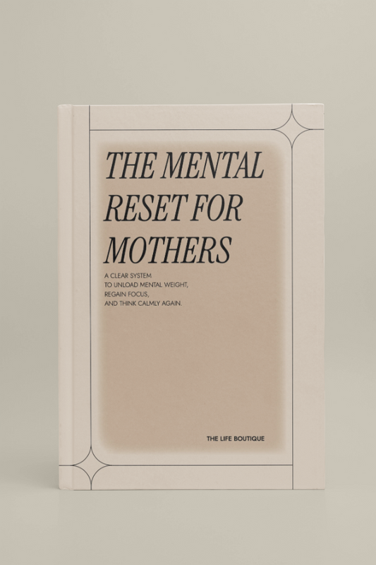 Book titled 'The Mental Reset for Mothers' by The Life Boutique on a beige background