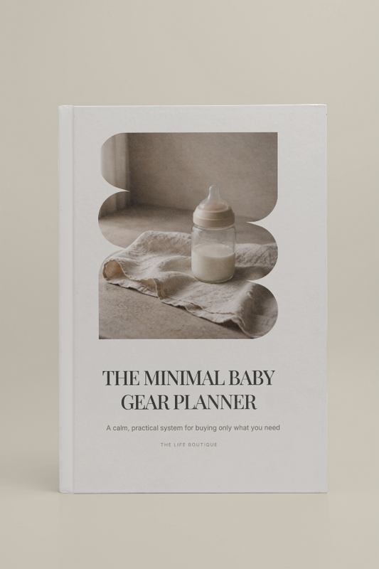 Book titled 'The Minimal Baby Gear Planner' with a baby bottle and blanket on the cover.