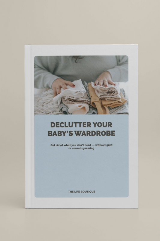 Book cover with text 'Declutter Your Baby's Wardrobe' on a beige background